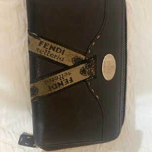 Severely worn Fendi wallet